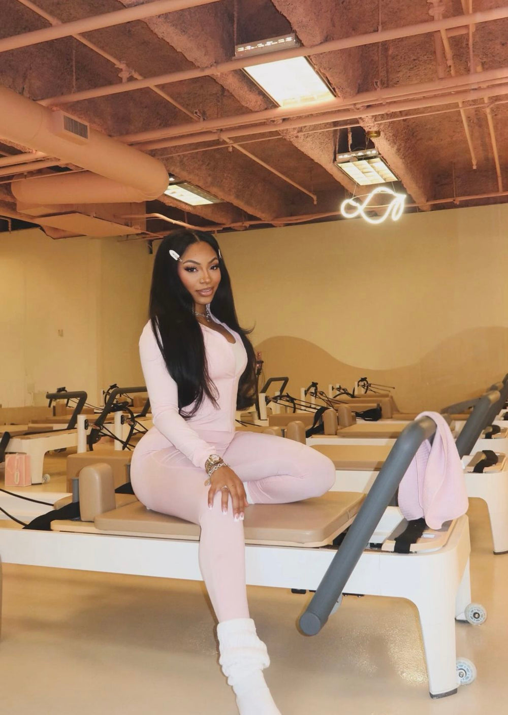 Woman working out with secure wig install — waterproof wig glue that lasts through exercise